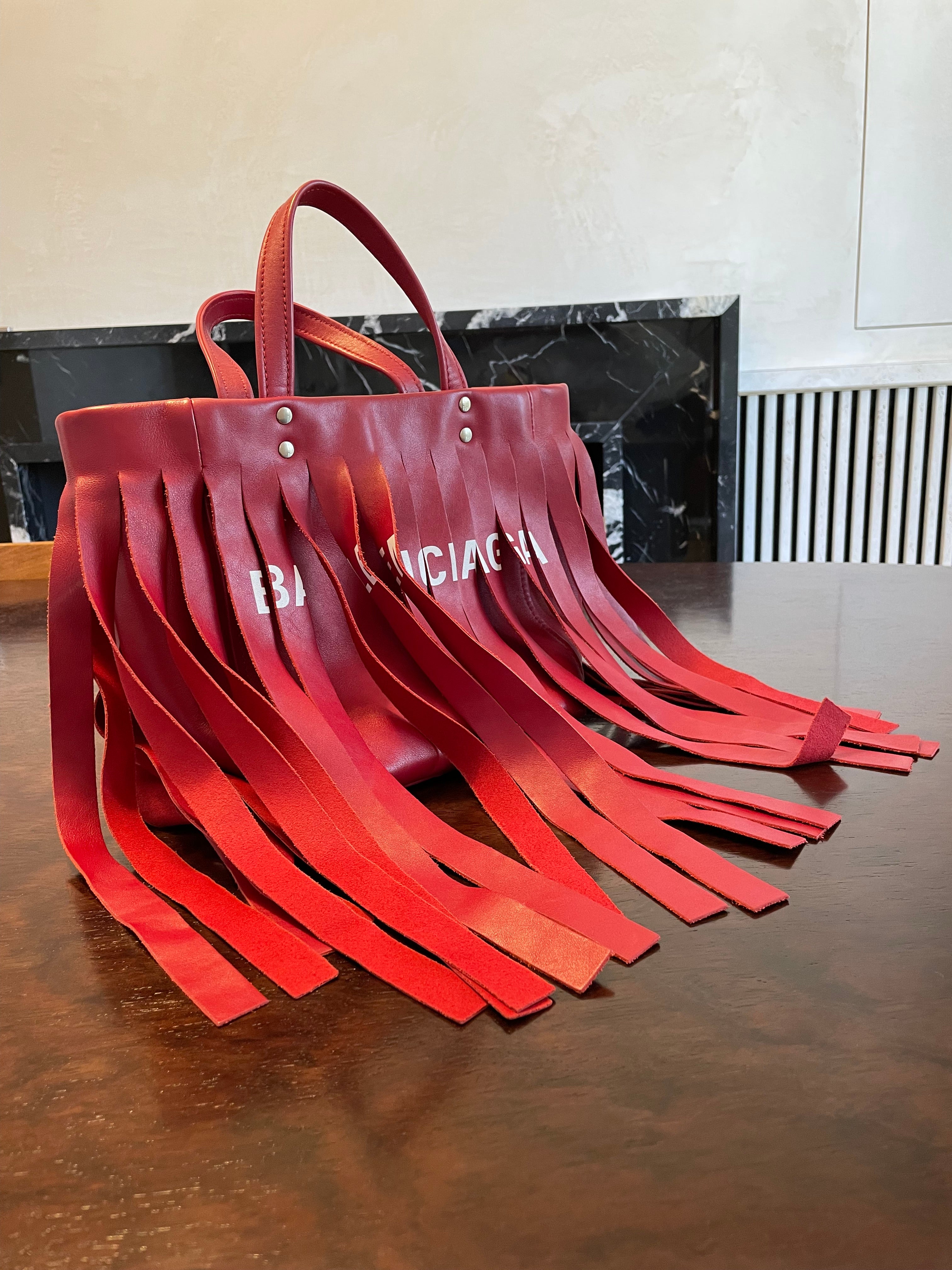 Balenciaga store fringe handbags